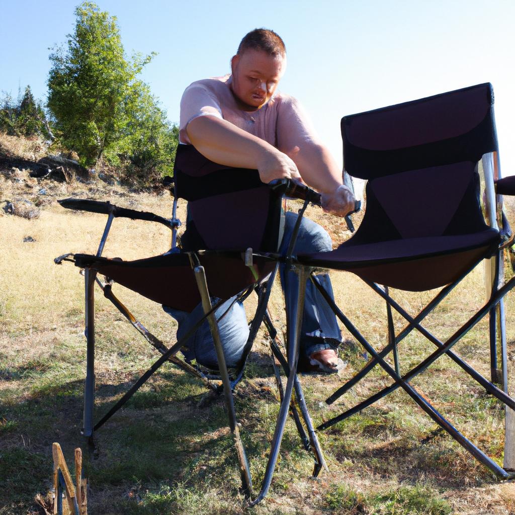 Person arranging camp chairs outdoors